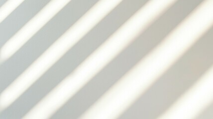 Obraz premium A white wall with a pattern of light and dark stripes