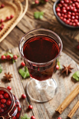 A glass of medicinal wine made of wild hawthorn berries