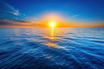 Obraz premium Aerial view of sunrise over the vast blue ocean