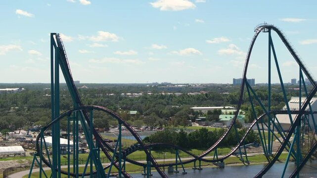 Adventure amusement park with high thrilling rollercoaster attraction in Orlando, Florida.