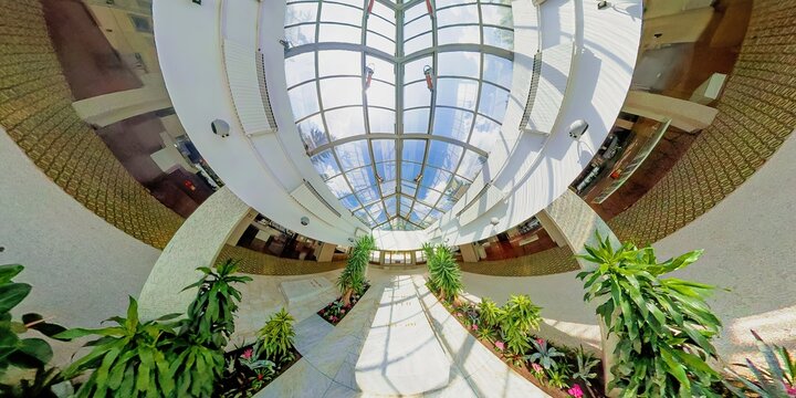 Belgrade, Serbia, Sept 1,2024: aerial view through glass roof onto white grave in modern building honoring Josip Broz Tito. Belgrade museum reflects socialist history