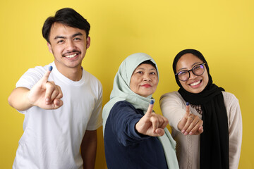 Three People Indonesian Family Showed Tinta Pemilu, Inked Finger