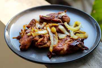Grilled chicken with onion. Perfect for recipe, article, catalogue, or any commercial purposes.