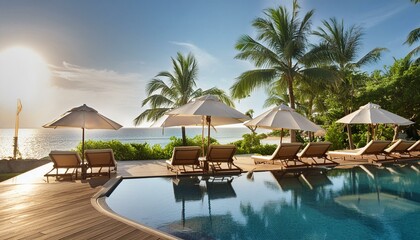 H&ocirc;tel &eacute;l&eacute;gant, belle piscine avec chaises longues et parasols, ambiance tropicale.