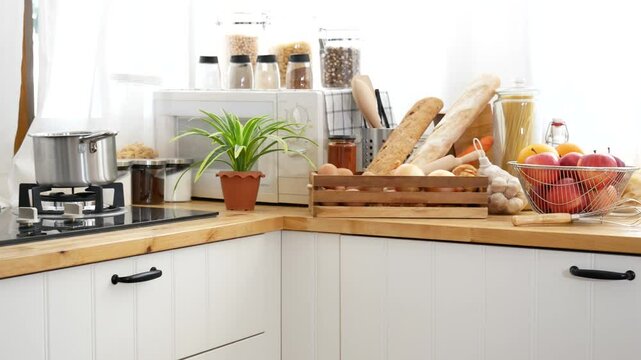 Kitchen background home interior bright simple decorate with bread garlic apple oil Preparing food meal. Warm home interior defocused mockup food shelf living space. Home showcase kitchen restaurant