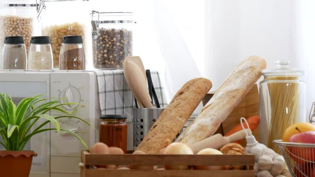 Kitchen background home interior bright simple decorate with bread garlic apple oil Preparing food meal. Warm home interior defocused mockup food shelf living space. Home showcase kitchen restaurant