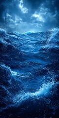 A stormy sea with a dark blue sky and crashing waves.