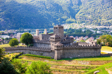 Fototapeta premium Scenic view of ancient stone Montebello Castle on hilltop in Swiss town of Bellinzona on sunny summer day, canton of Ticino