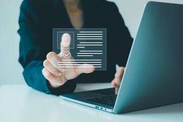Digital identification or digital ID concept. Businessman use laptop and hand touch virtual screen of digital identification card to accessing databases by digital identity for cyber security.