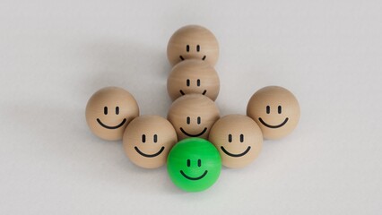 Wood cube with smile face. Facial expressions. Mental health assessment.GREEN leader.3D rendering on black background.
