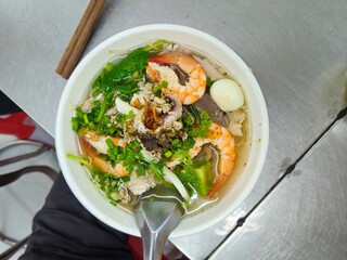 Top view of sea food noodles in Vietnam.
