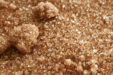 Clumped brown sugar texture background. Cooking preparation concept.