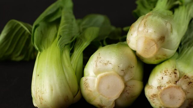 Close-up of fresh bok choy, showcasing the vegetable's crisp texture and natural colors, perfect for healthy cooking and nutritious meals.