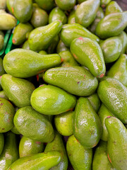 Stacked of Fresh Avocado at Supermarket