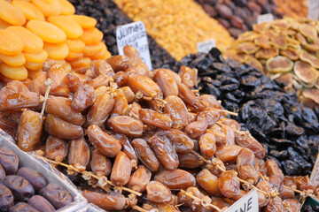 A Colorful and Attractive Variety of Dried Fruits and Dates Artistically Arranged in Market Display