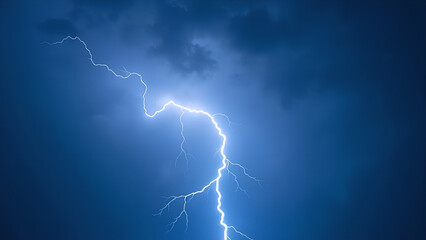 Thunder and lightning on a background with a blue sky Light thunderstorm with strikes in the dark Clouds with a powerful electric charge