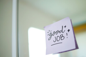 Purple Sticky Note With Text Good Job on Mirror Glass