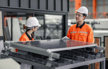Factory metal workers install solar panels, cut costs, earn carbon credits, combat climate change.