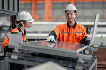Factory metal workers install solar panels, cut costs, earn carbon credits, combat climate change.