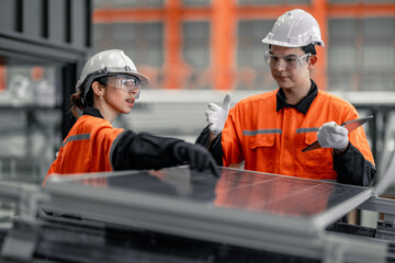 Factory metal workers install solar panels, cut costs, earn carbon credits, combat climate change.