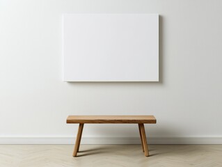 Minimalist interior with a wooden bench and a blank canvas on a white wall.