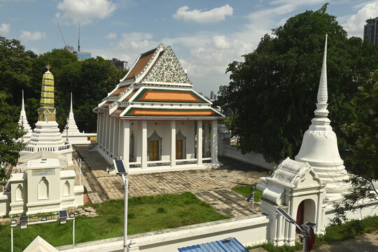 White Buddhism Church at Wat Nang Chee Chotikaram has an ordination hall without the raka's leaf chorfa and swan's tail, which are royal art styles popular in the reign of King Rama III. Bangkok city.