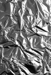 Shiny silver foil texture. Silver foil background crumpled paper texture
