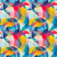 Vibrant abstract pattern with overlapping circles in vibrant shades of red, orange, yellow and turquoise. Seamless background