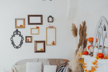 Cozy living room decor featuring ornate frames and seasonal accents in a warm atmosphere