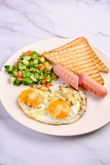 Breakfast Plate with Eggs, Vegetables, and Sausages