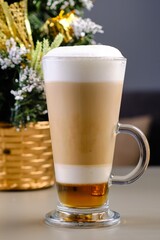 Latte Against a Christmas Tree Background