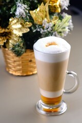 Latte Against a Christmas Tree Background