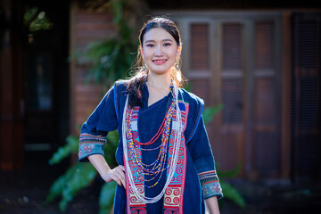 Fashionable portrait beautiful girl. Hill tribe clothing has been redesigned to suit the current era and modern city people's lifestyle.