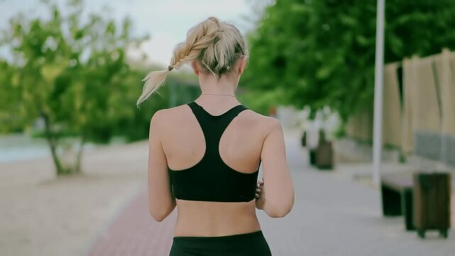 Triathlete preparing for jogging, sprinting and stamina exercises	