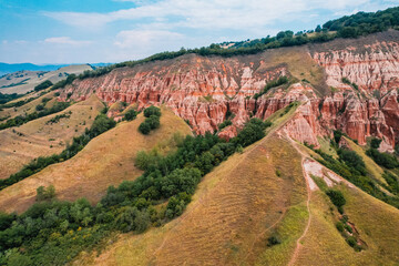 Red rocky slopes Rapa Rosie is a protected geological and floristic reservation area near Sebes alba in Romania