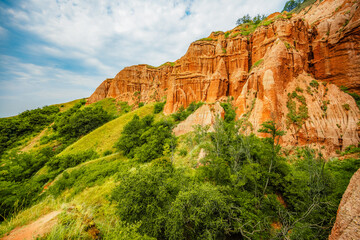 Red rocky slopes Rapa Rosie is a protected geological and floristic reservation area near Sebes...