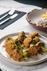 Plate of Fried Broccoli with Red Lemonade