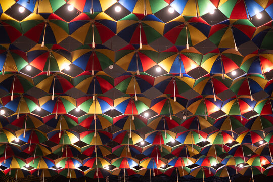 Frevo umbrellas lined up on the ceiling".