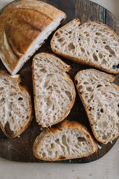 Overhead shot of artisanal bread arranged on a board