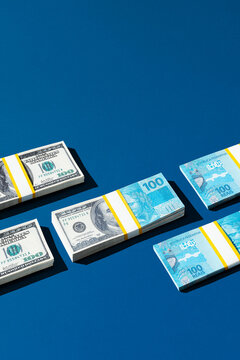 One hundred US dollars to Brazilian real, money exchange concept