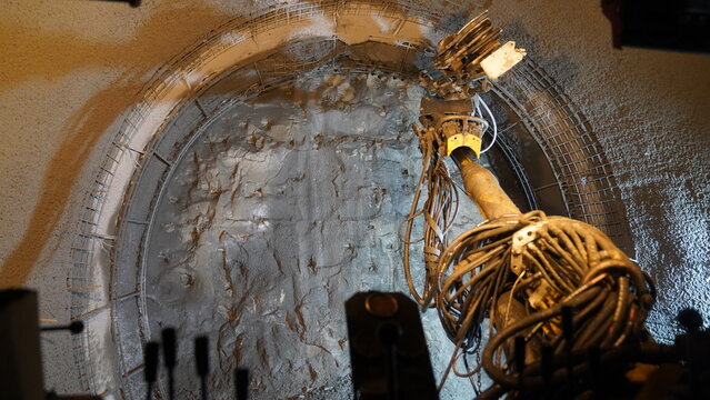 work vehicle drilling into the ground in metro tunnel construction