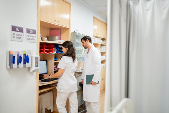 Medical staff working at nurse station