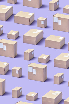 Different sized wrapped boxes with attached white labels