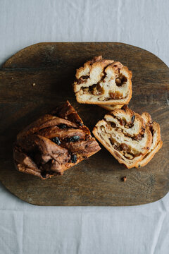 Artistic presentation of nutty bread on rustic board