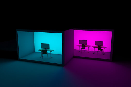 Modern work area featuring two desks with computers and chairs