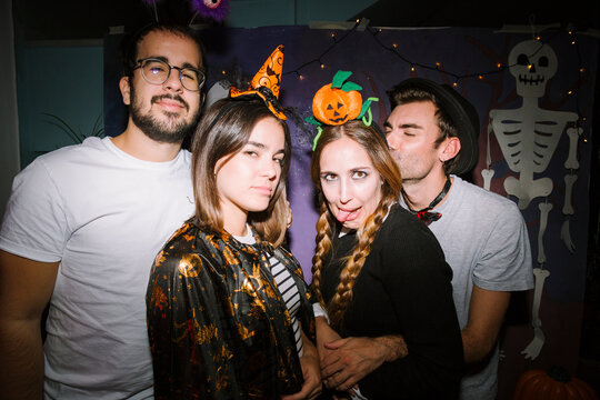 Group posing at Halloween party