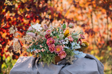 Autumn floral composition with variety flowers out