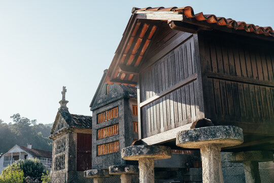 Traditional stone and wood horreos in Combarro rural village