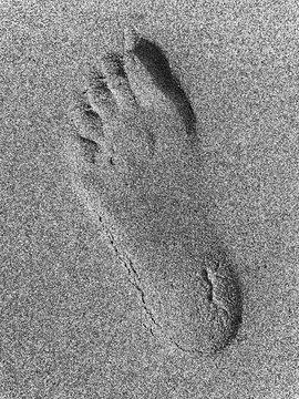 Footprint in sand