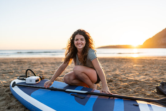 Smiling surfer woman.